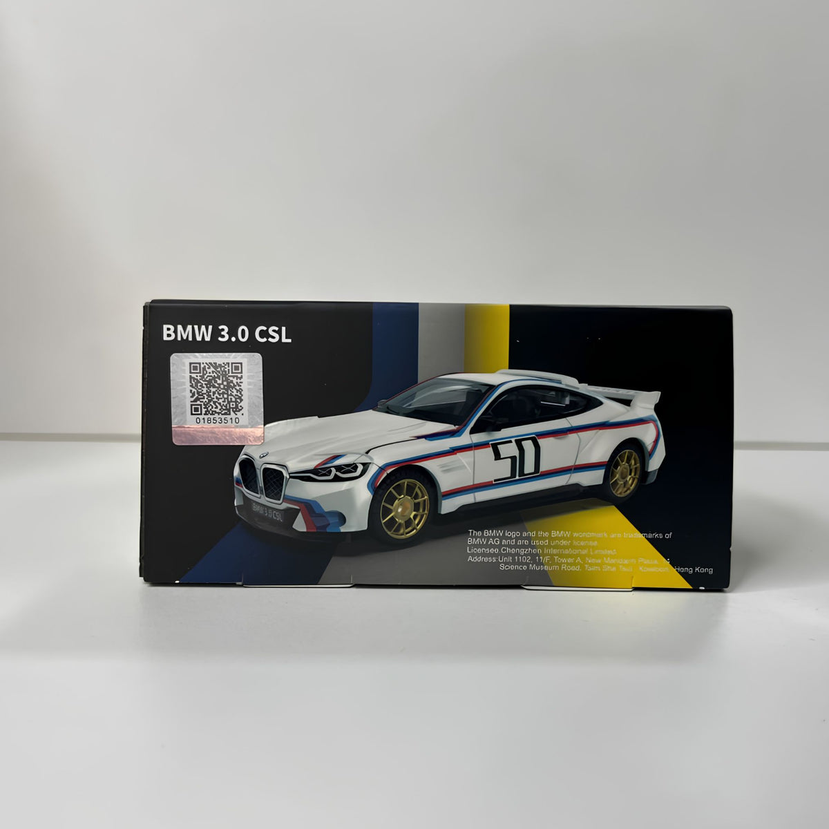 Clear acrylic display case housing the CCA BMW 3.0 CSL model car ready for hobby shop replenishment
