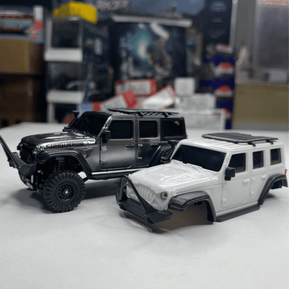 2.4GHz remote controller and replacement body shell displayed with the HB Toys R4308 for hobby shop orders