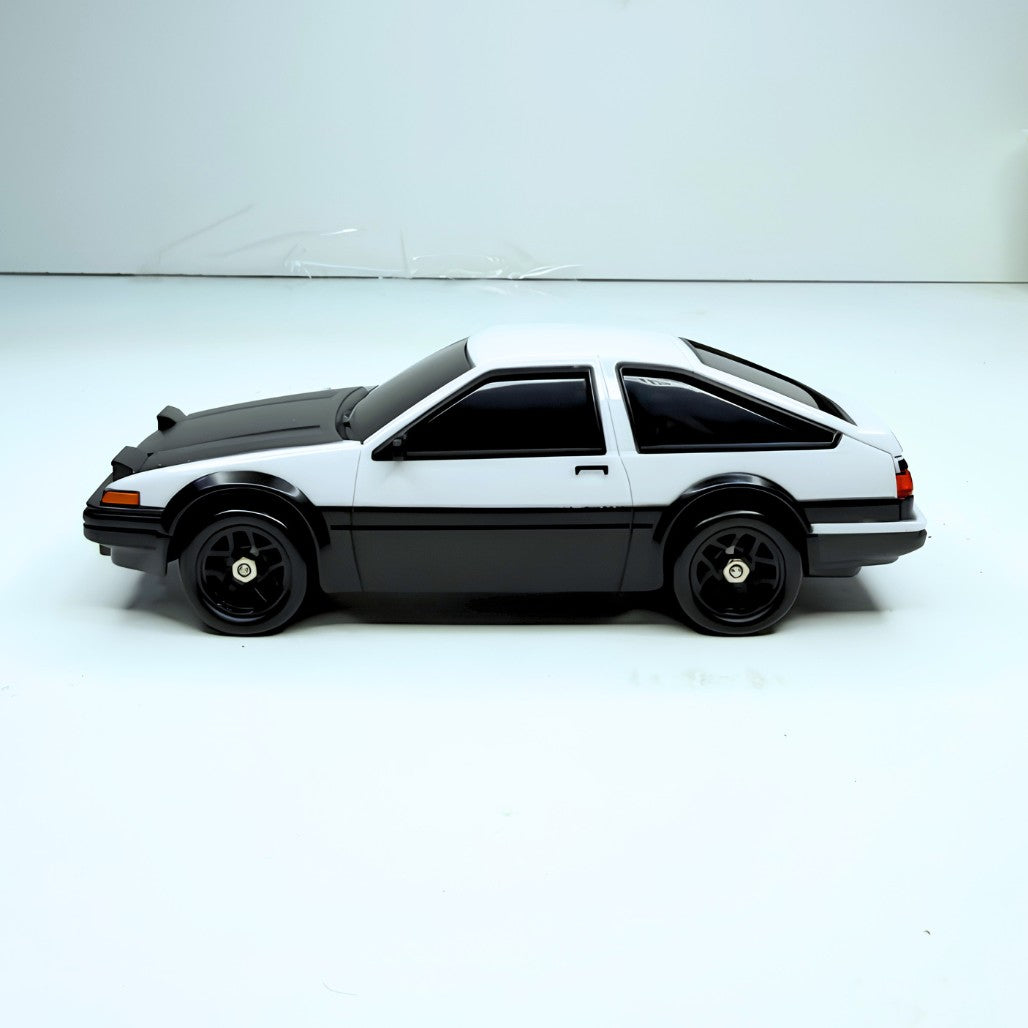 Action stance of the white Whoosh Mazda RX-7 drift RC car supplied for pan India wholesale distribution and dealer networks