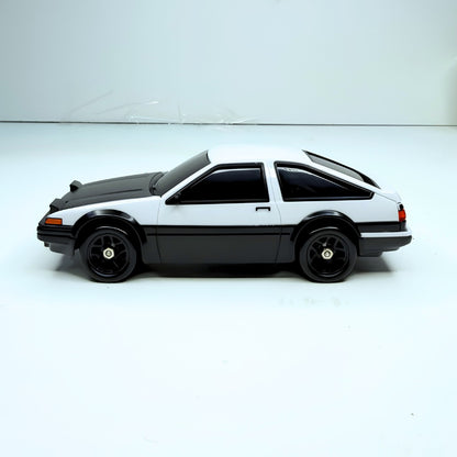 Action stance of the white Whoosh Mazda RX-7 drift RC car supplied for pan India wholesale distribution and dealer networks