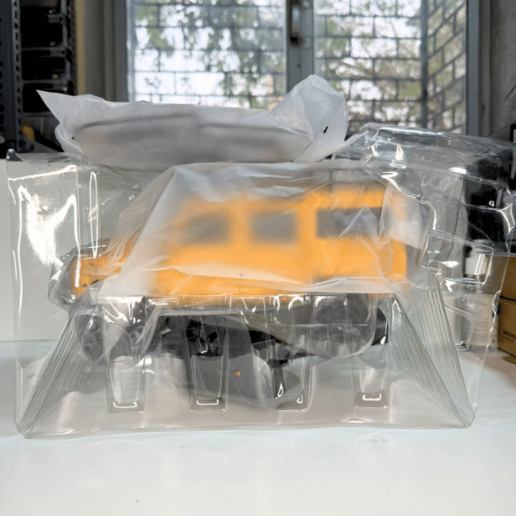 Close up view of the front headlights and yellow body shell for commercial distributor wholesale pricing and display