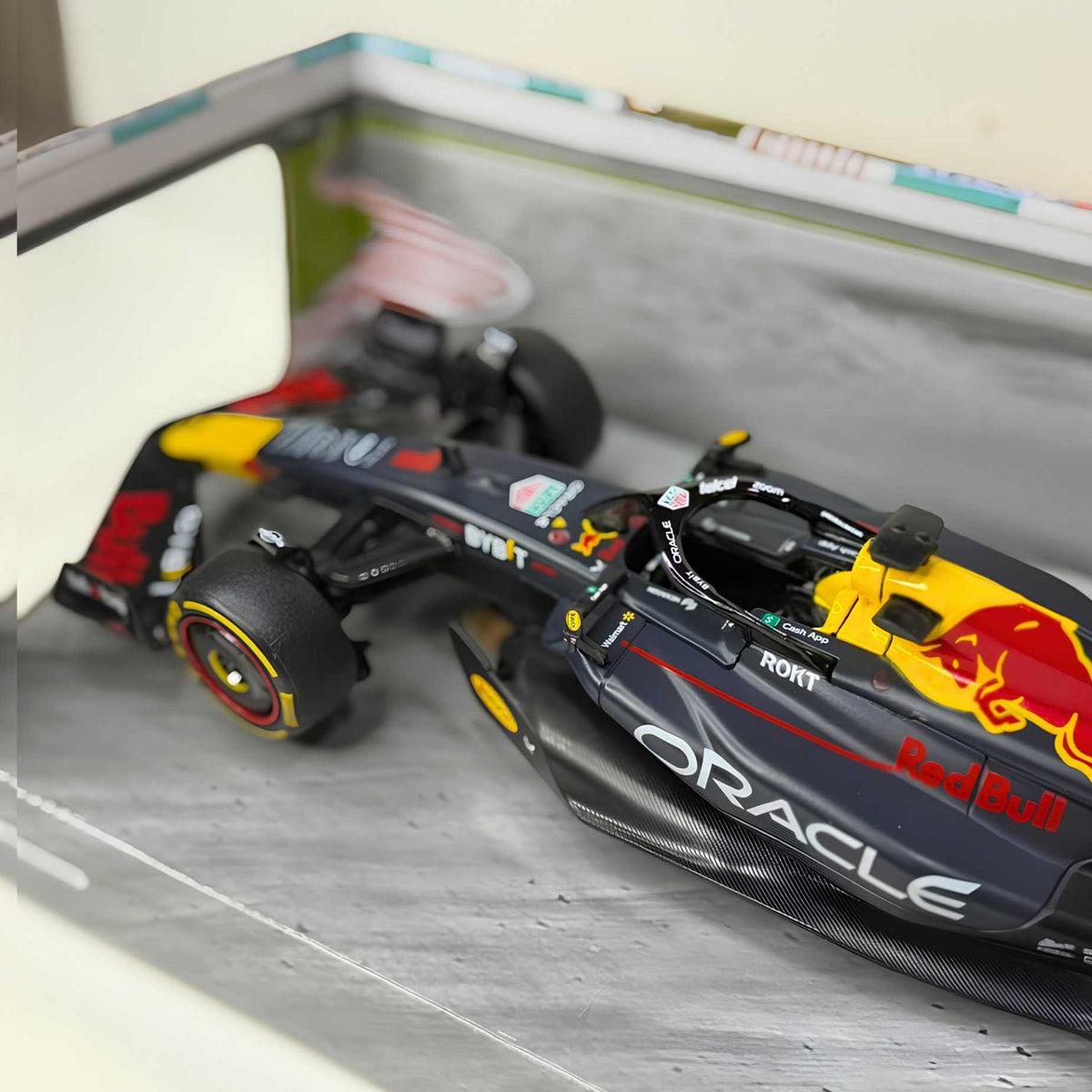 Close view of the rubber tires with Pirelli markings on the Rastar RB19 diecast model for distributor pricing