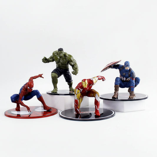Four Marvel superhero action figures on display stands: Spider-Man, Hulk, Iron Man, and Captain America, arranged on a light gray background.