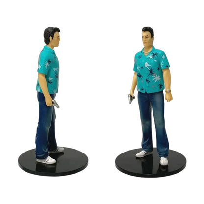 Front view of the Tommy Vercetti 18cm figurine in a teal shirt with a silver pistol. (83