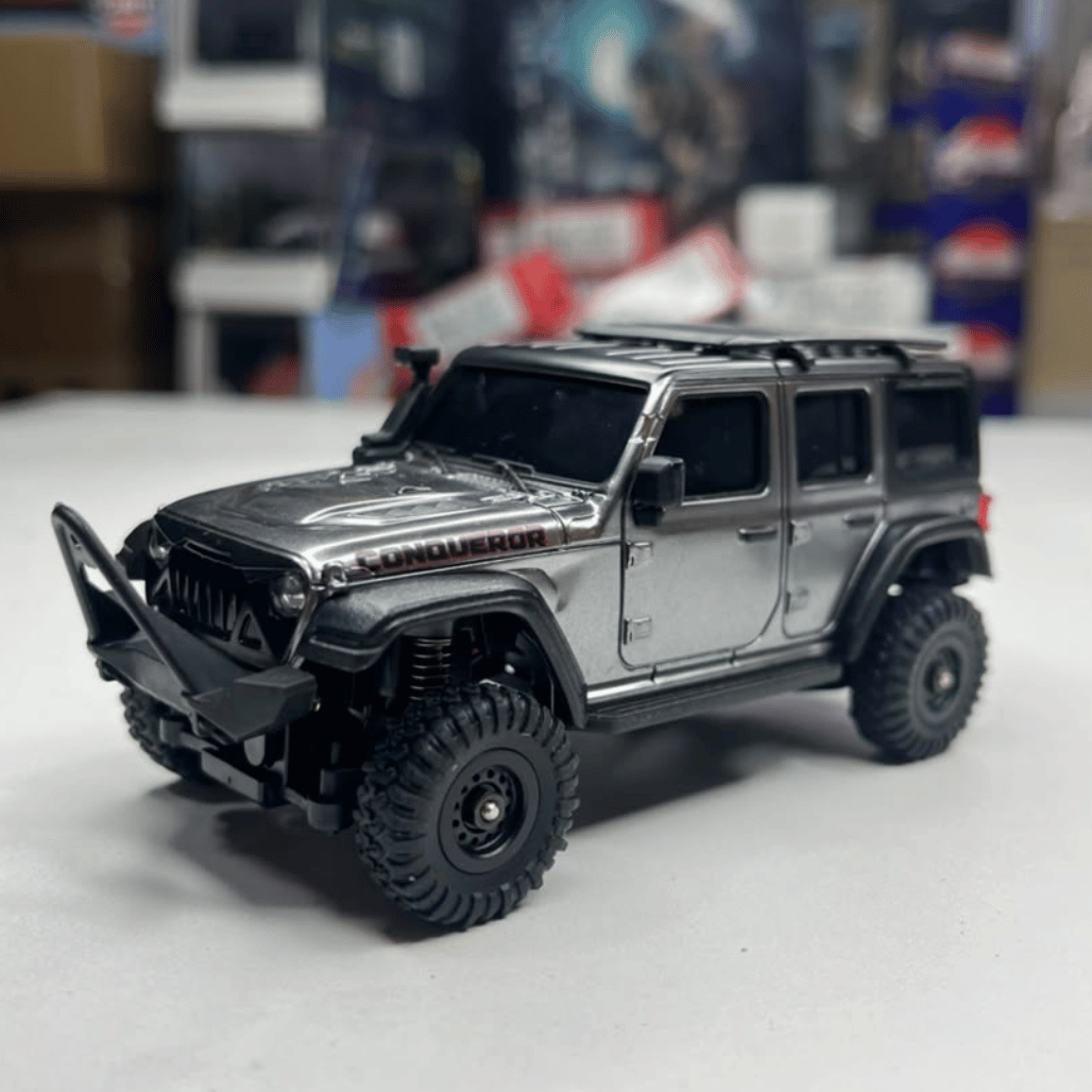 Side profile view of the 12cm silver HB Toys R4308 Jeep Wrangler crawler model ready for retail stock wholesale orders