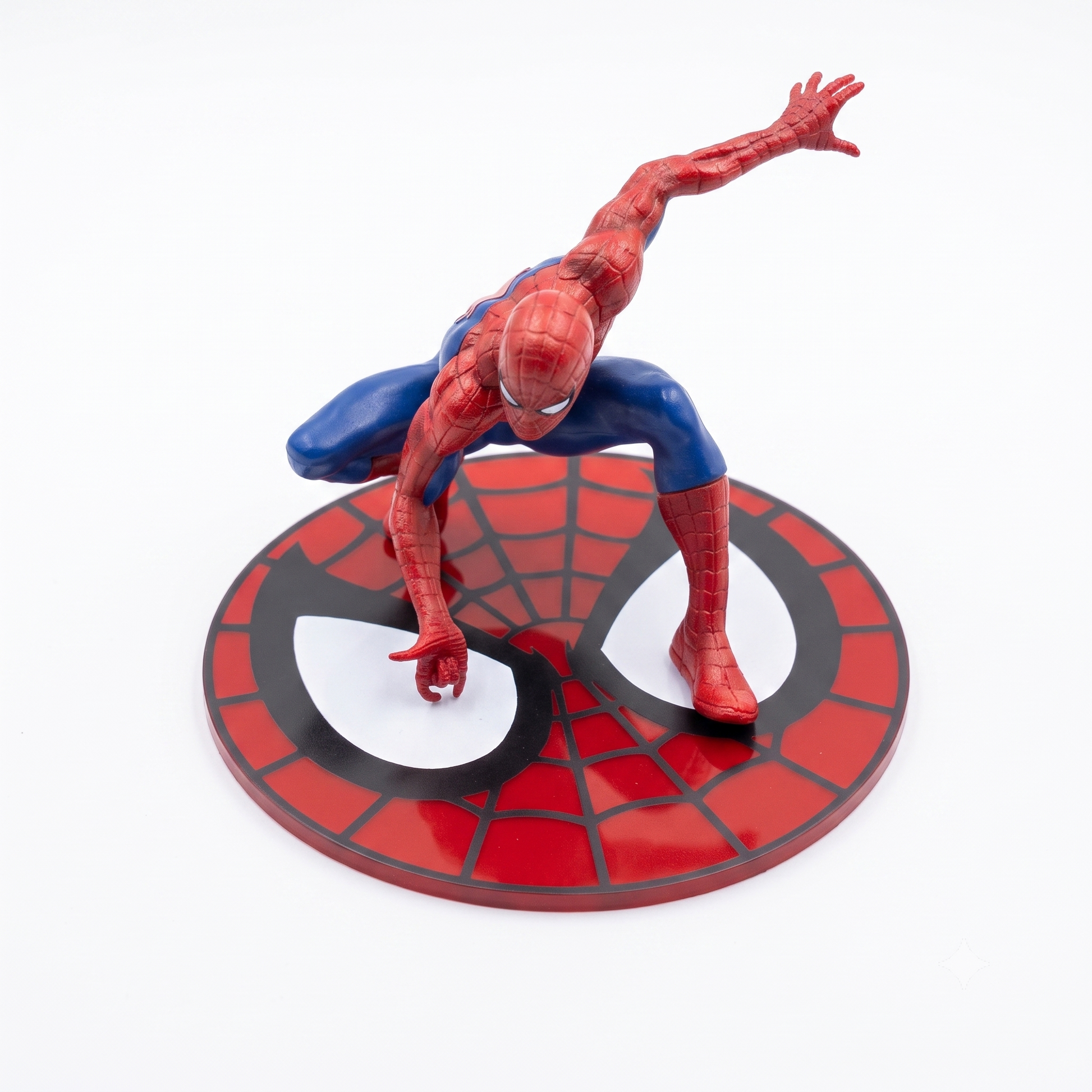 Spider-Man crouching pose PVC action figure with mask emblem base