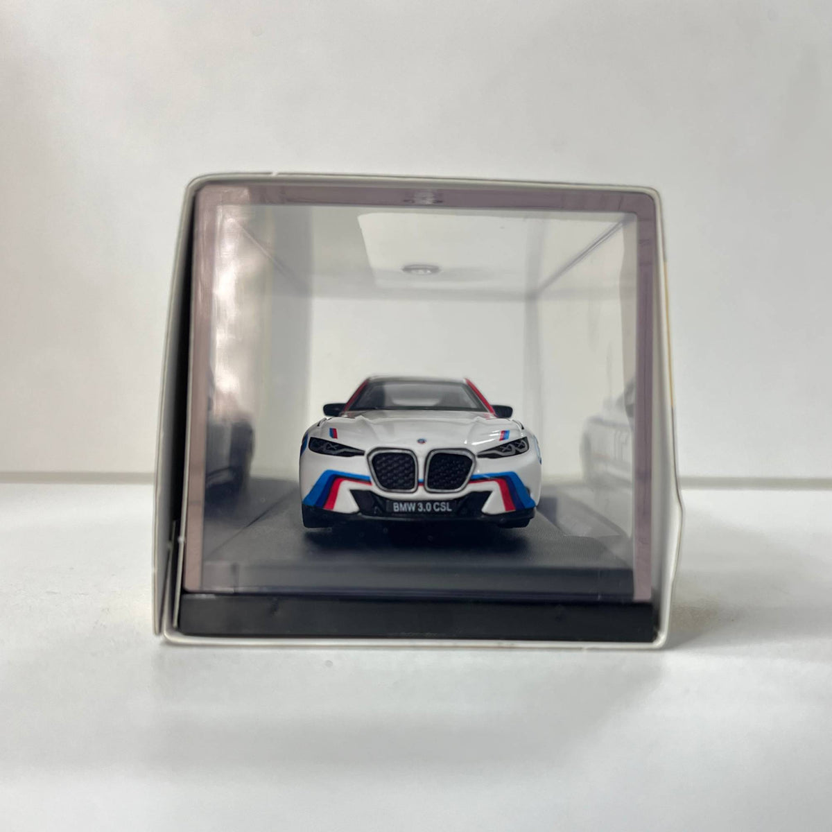 Overhead view of classic M racing stripes on the CCA BMW 3.0 CSL diecast car for bulk orders in India