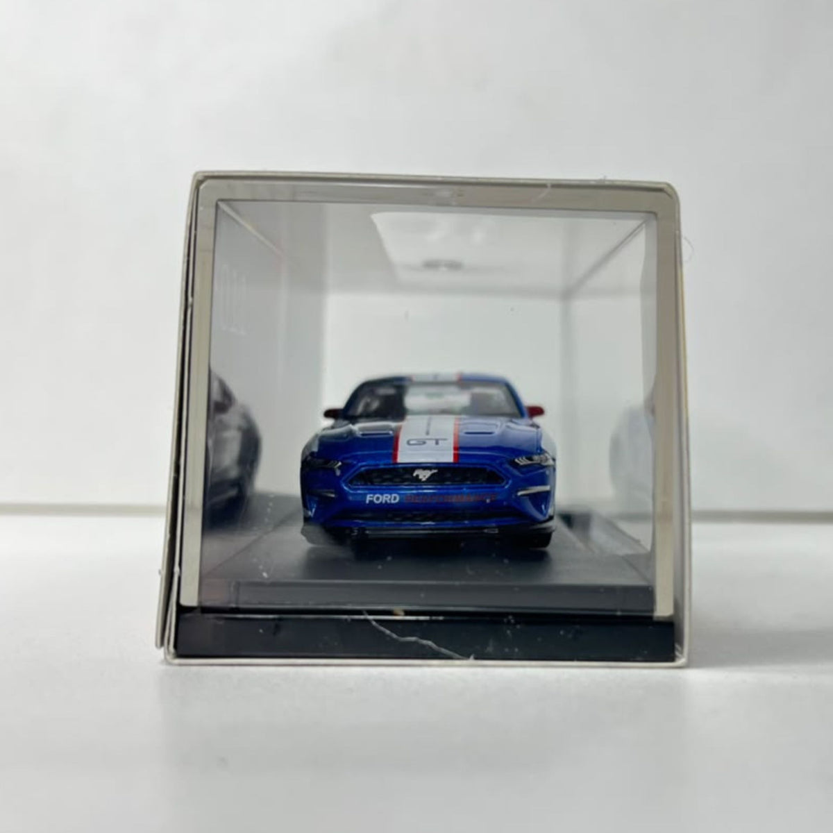 Display stance of the blue CCA 2018 Ford Mustang Shelby 1:64 diecast car for toy shop inventory