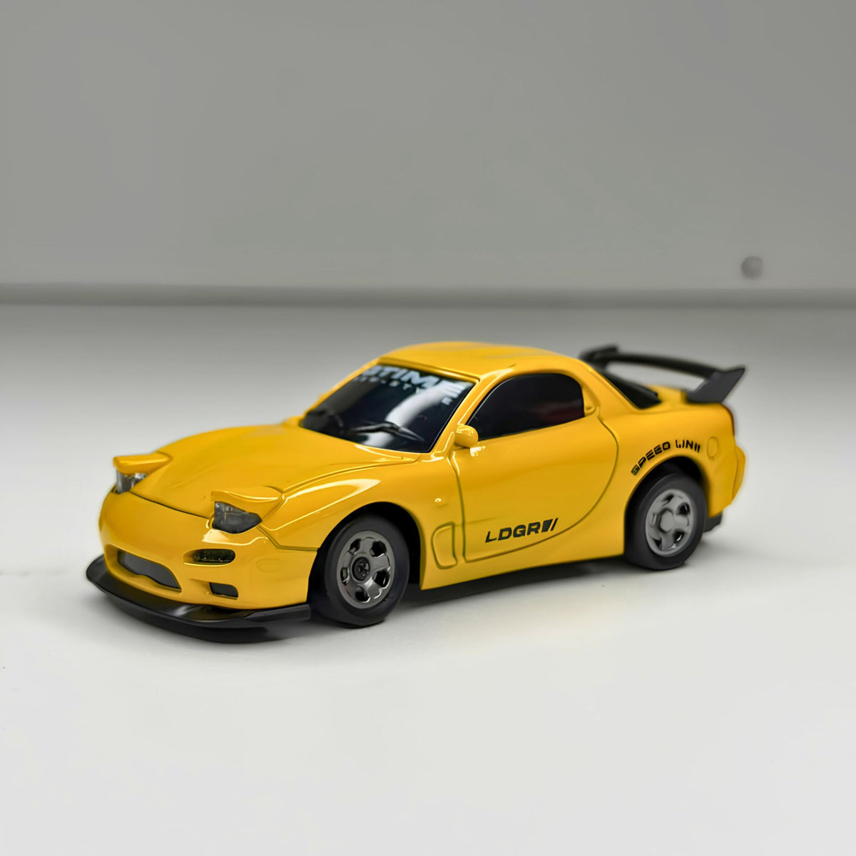 Rear chassis view of the LDRC 3603 drift car showing electronic underglow trim for distributor pricing