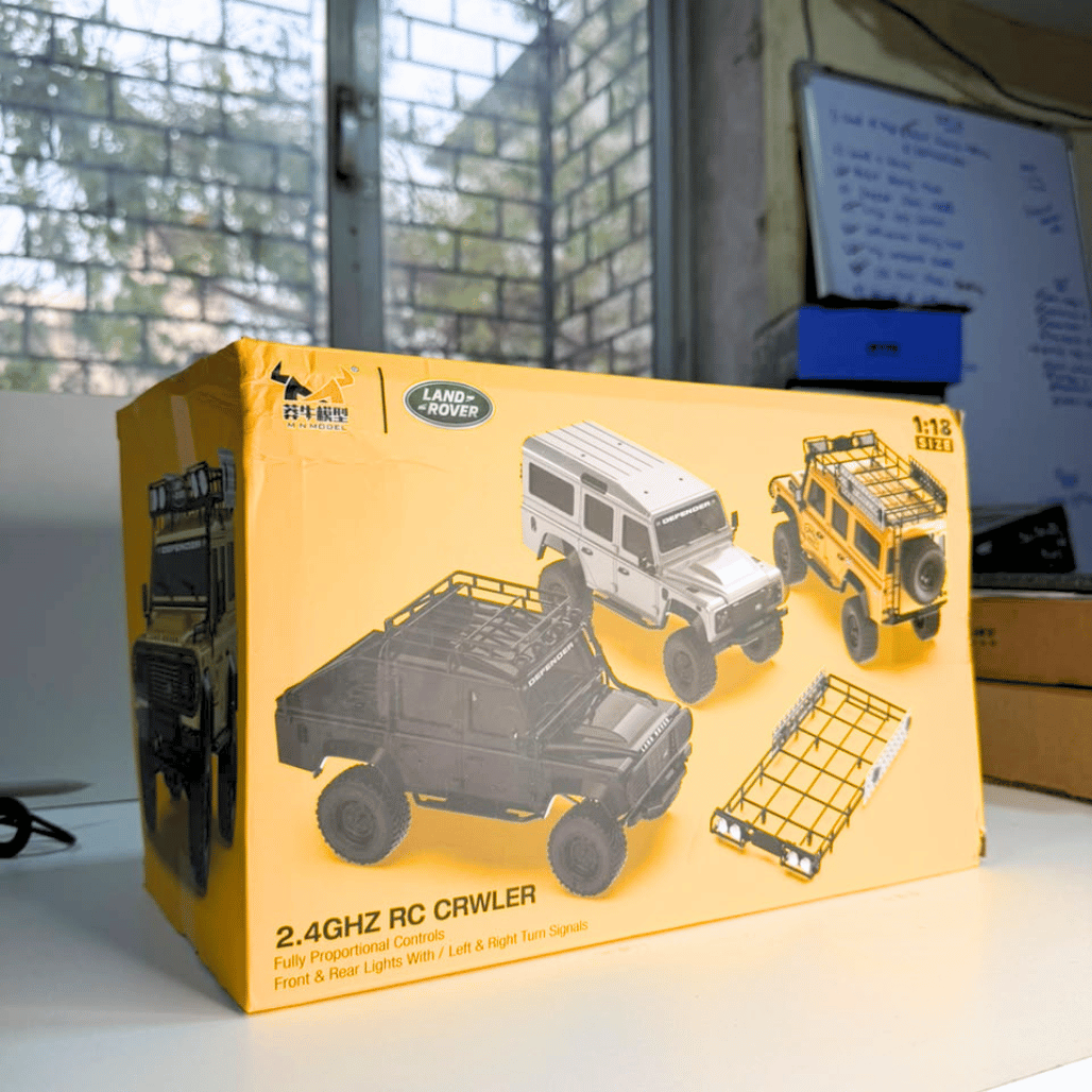 mn-model-mn-111c-land-rover-defender-yellow-retail-box