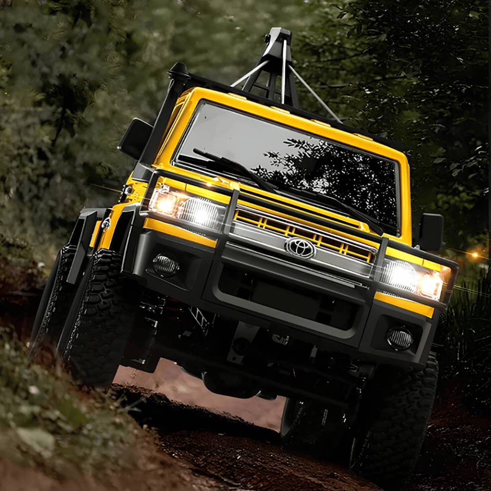 Side profile view of the 37cm yellow MN Model MN82T crawler showing recovery crane ready for retail store stock