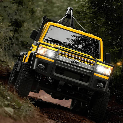 Side profile view of the 37cm yellow MN Model MN82T crawler showing recovery crane ready for retail store stock