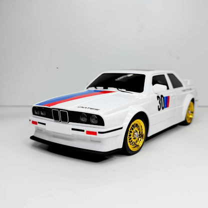 Black WHOOSH BMW E30 1/16 scale RC drift car front view with gold mesh rims for low wholesale price India and online shop